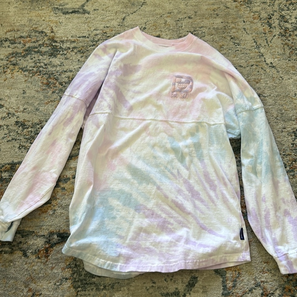 Disney’s large, tie-dyed, jersey and pink and purple and blues gently used